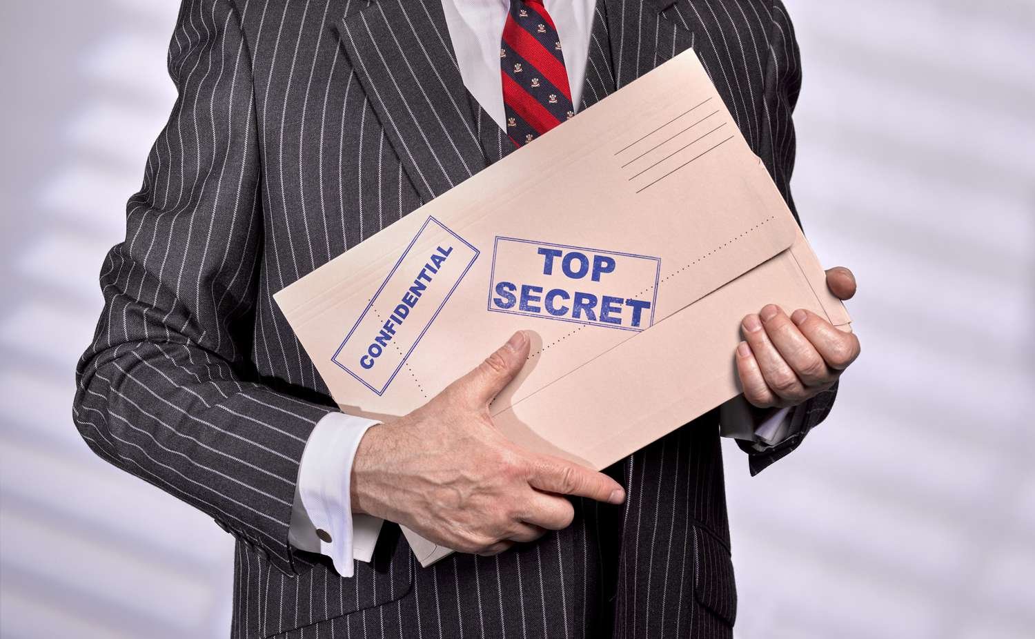 Classified Information: Definition, Examples, and Laws